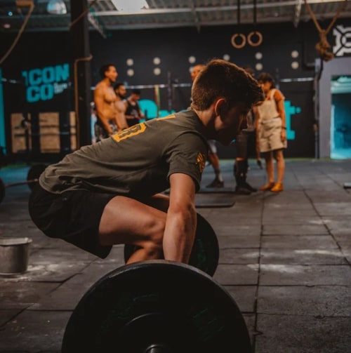 A boy doing deadlift